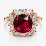 Rose Gold-Tone Cushion Cut Red Stone Ring with Floral Halo Design