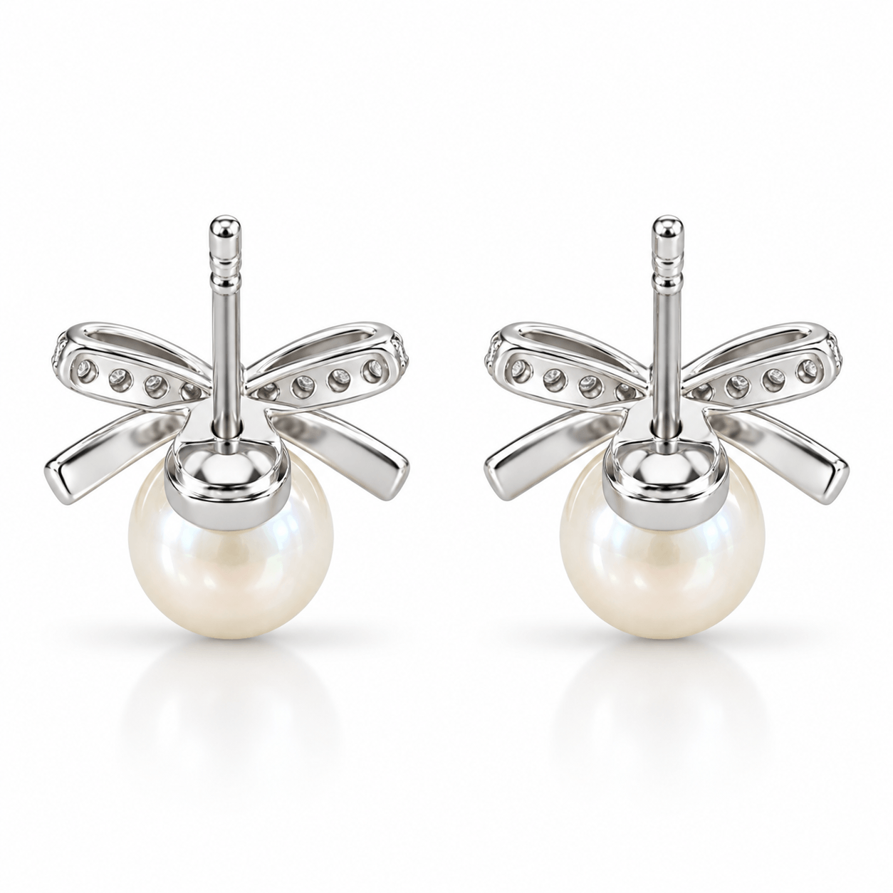 Pearl Bow Stud Earrings with Sparkling Stones