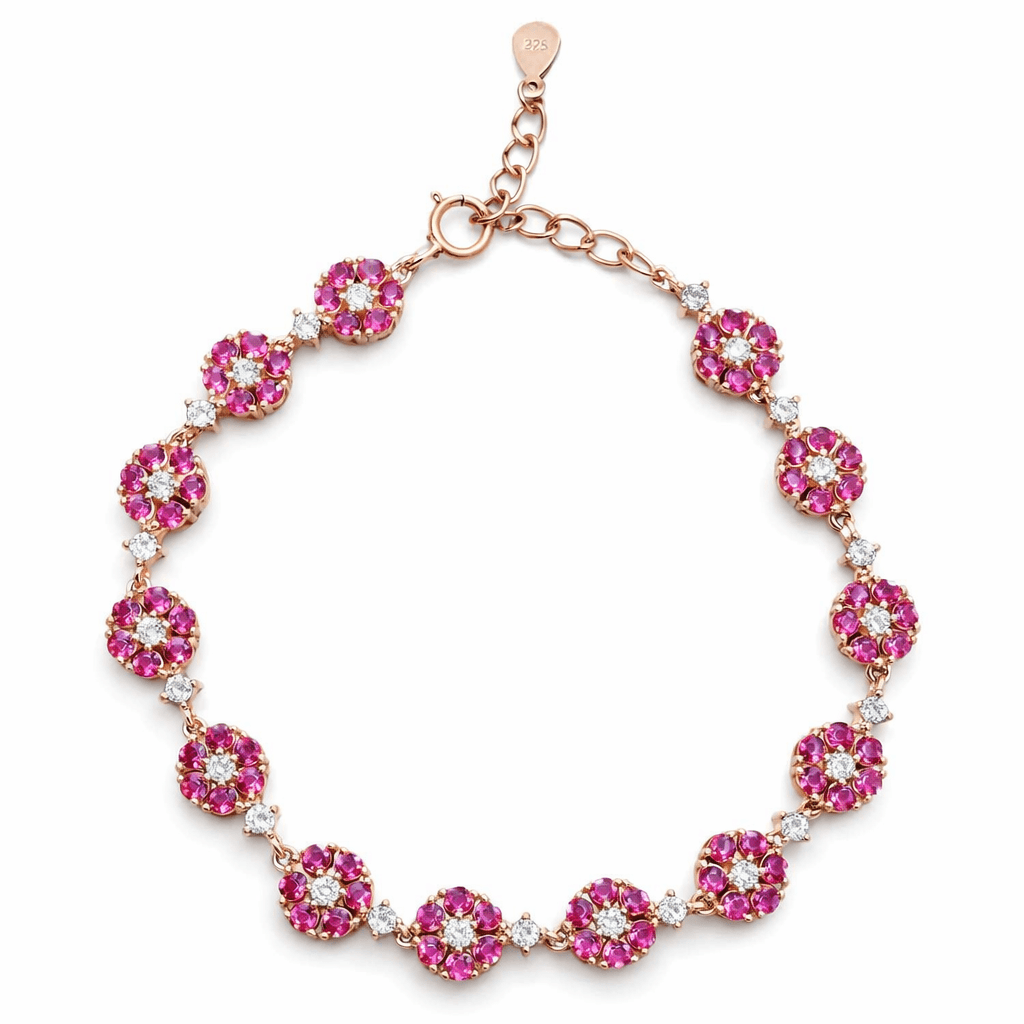 Elegant Gold Tone Floral Bracelet with Pink Stone Cluster Design
