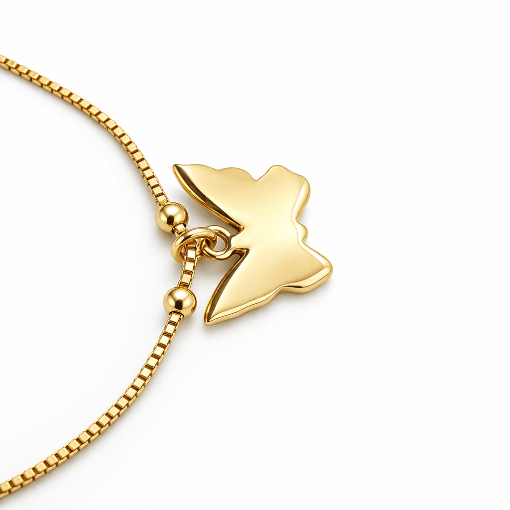 Gold Tone Bow Charm Anklet with Delicate Chain and Adjustable Fit